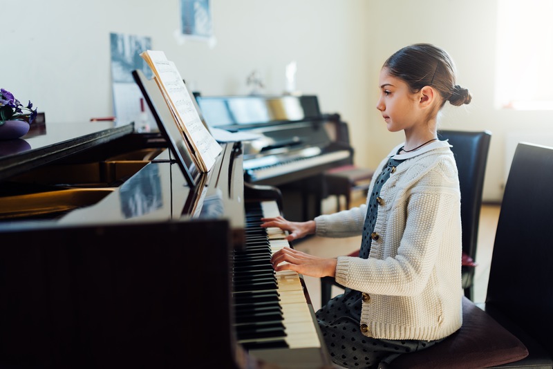 Playing Piano by Ear: Top Tips from Your Denver Piano Movers