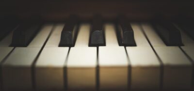 Upright wooden piano keys and details