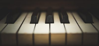 Upright wooden piano keys and details