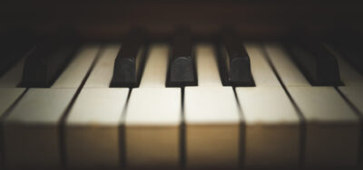 Upright wooden piano keys and details