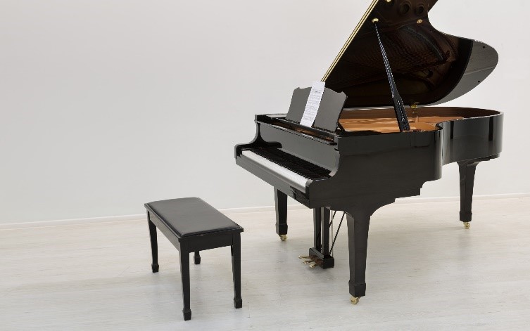 how much does a 5 foot baby grand piano weigh